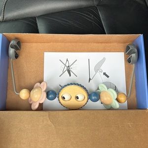 New BabyBjorn Toy Bar for Bouncer. Box slightly damaged.